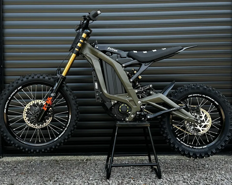 MANTA custom Sur-Ron build with Fox forks on a workshop stand
